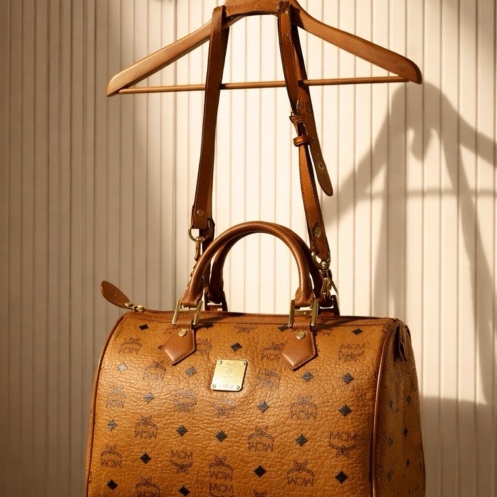 Beautiful MCM Cognac Visetos Monogram Dome Duffel with Detachable Strap.😍